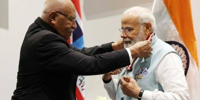 Editorial on pm narendra modi honored with highest civilian award by Fiji and Papua New Guinea