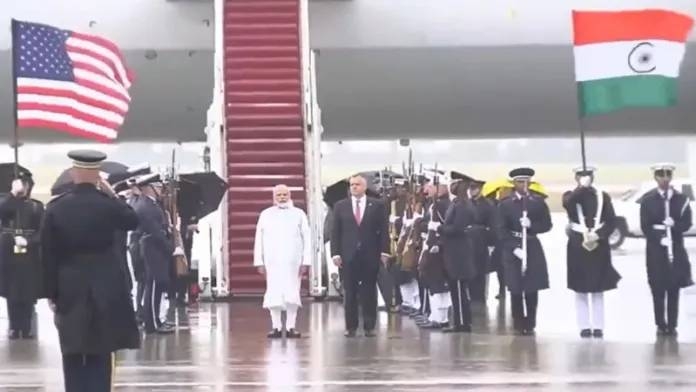 pm-modi-us-visit-guard-of-owner-at-washington-andrews-airport-rain-national-anthem