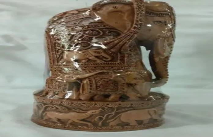 PM Narendra Modi gifts sandalwood sitar to Emmanuel Macron 